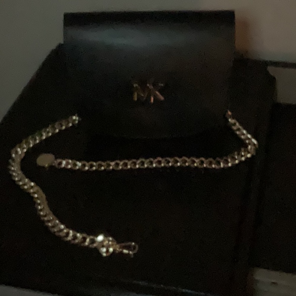 Michael Kors bum bag black with gold hardware.